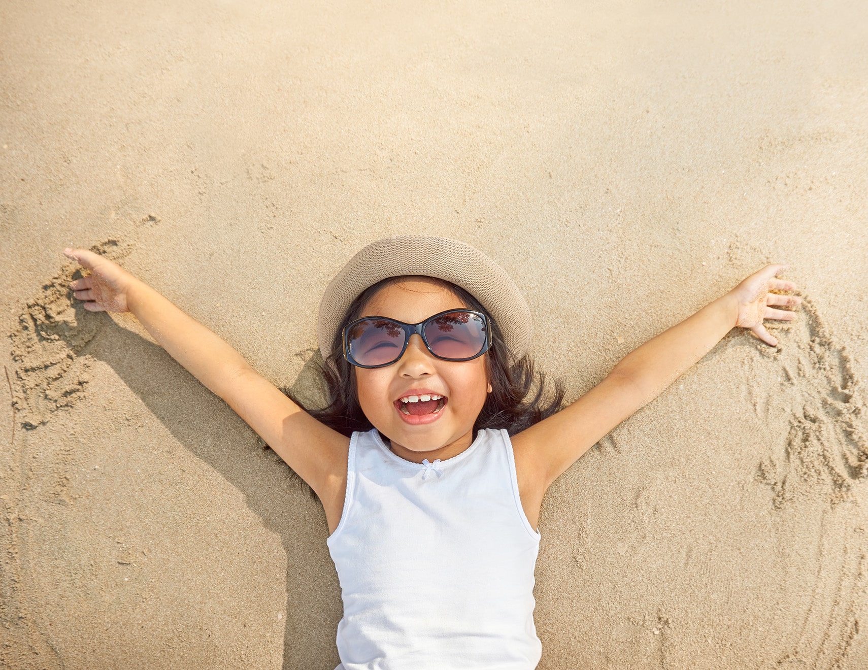 child at the beach Clermont Lakes Dental Care in Clermont, FL