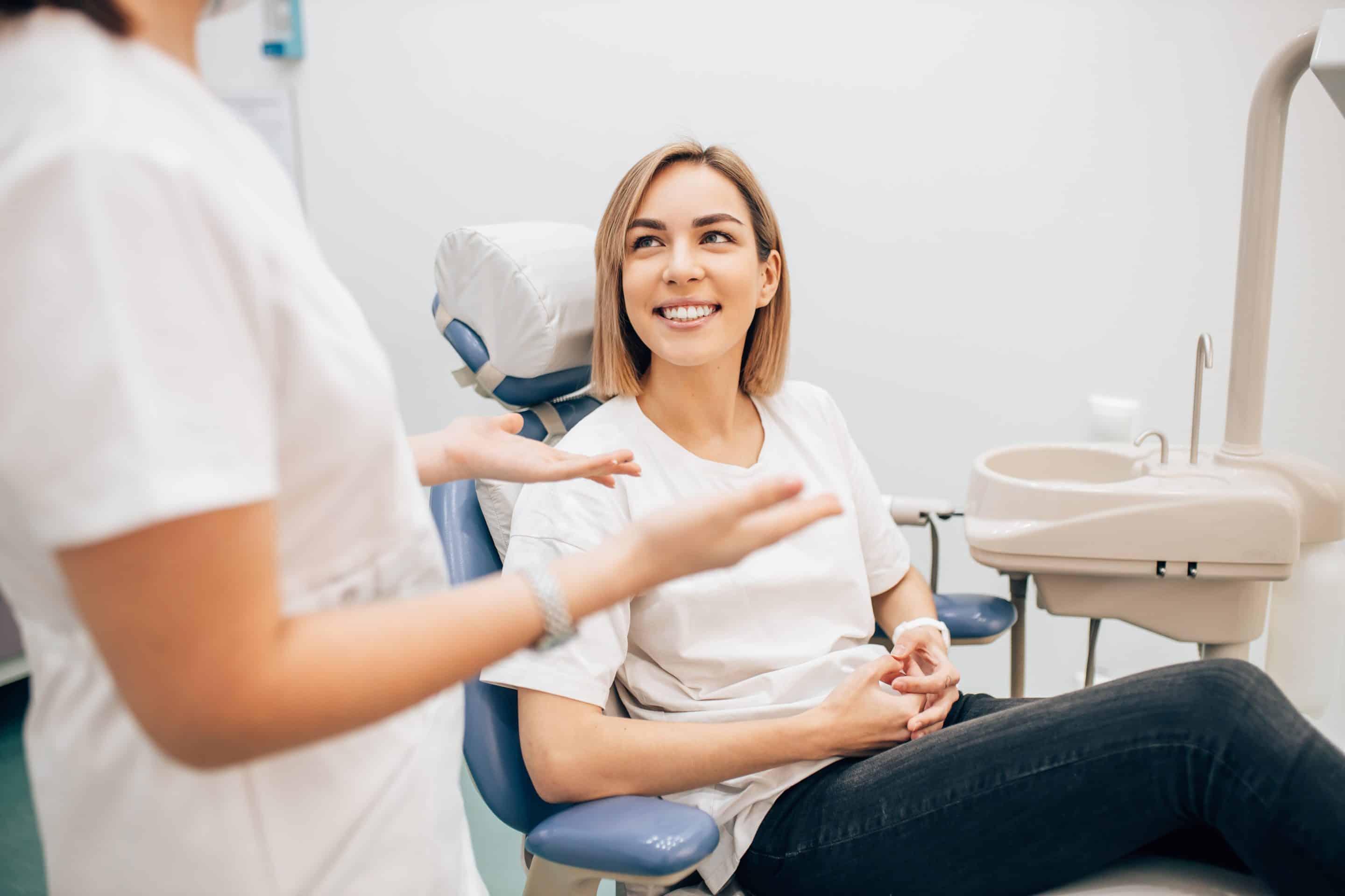 dental patient talking with dr wakim during dental bridge consultation at clermont lakes dental care